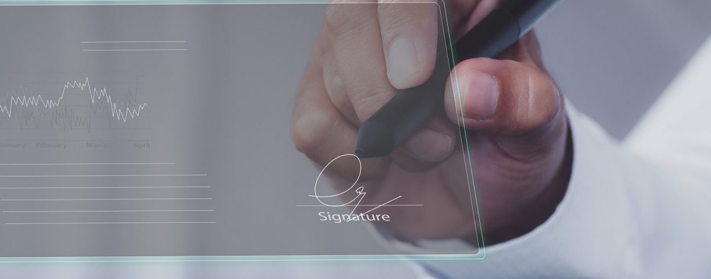 businessman use electronic pen sign signature on electronic  E-signing, data sheet document management, paperless office concept. Businessman using stylus pen signing e document on digital tablet.